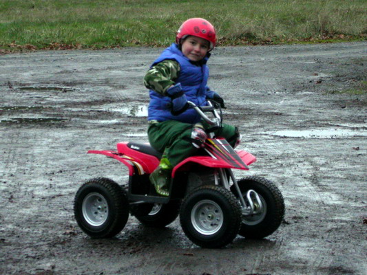 Ryan On Mini-ATV by Josh Poulson Ryan On Mini-ATV by Josh Poulson