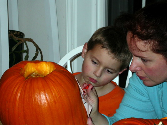Misty and Ryan Carving Pumpkins by Josh Poulson Misty and Ryan Carving Pumpkins by Josh Poulson