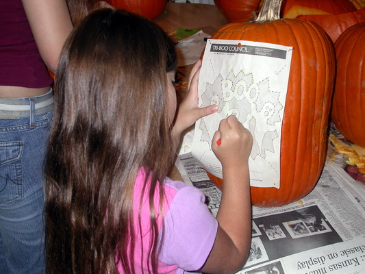 Kimmy Carving Pumpkins by Josh Poulson Kimmy Carving Pumpkins by Josh Poulson
