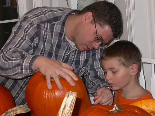 Josh and Ryan Carving Pumpkins by Misty Poulson Josh and Ryan Carving Pumpkins by Misty Poulson